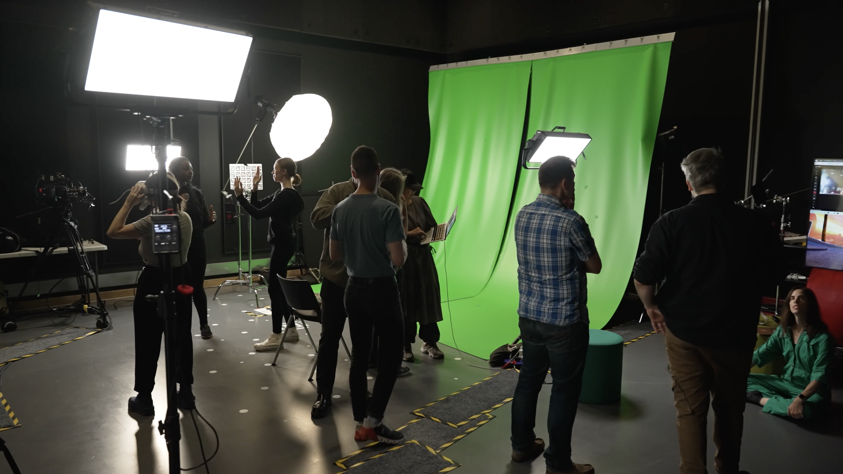 Using the XR studio showing green screen and workshop participants